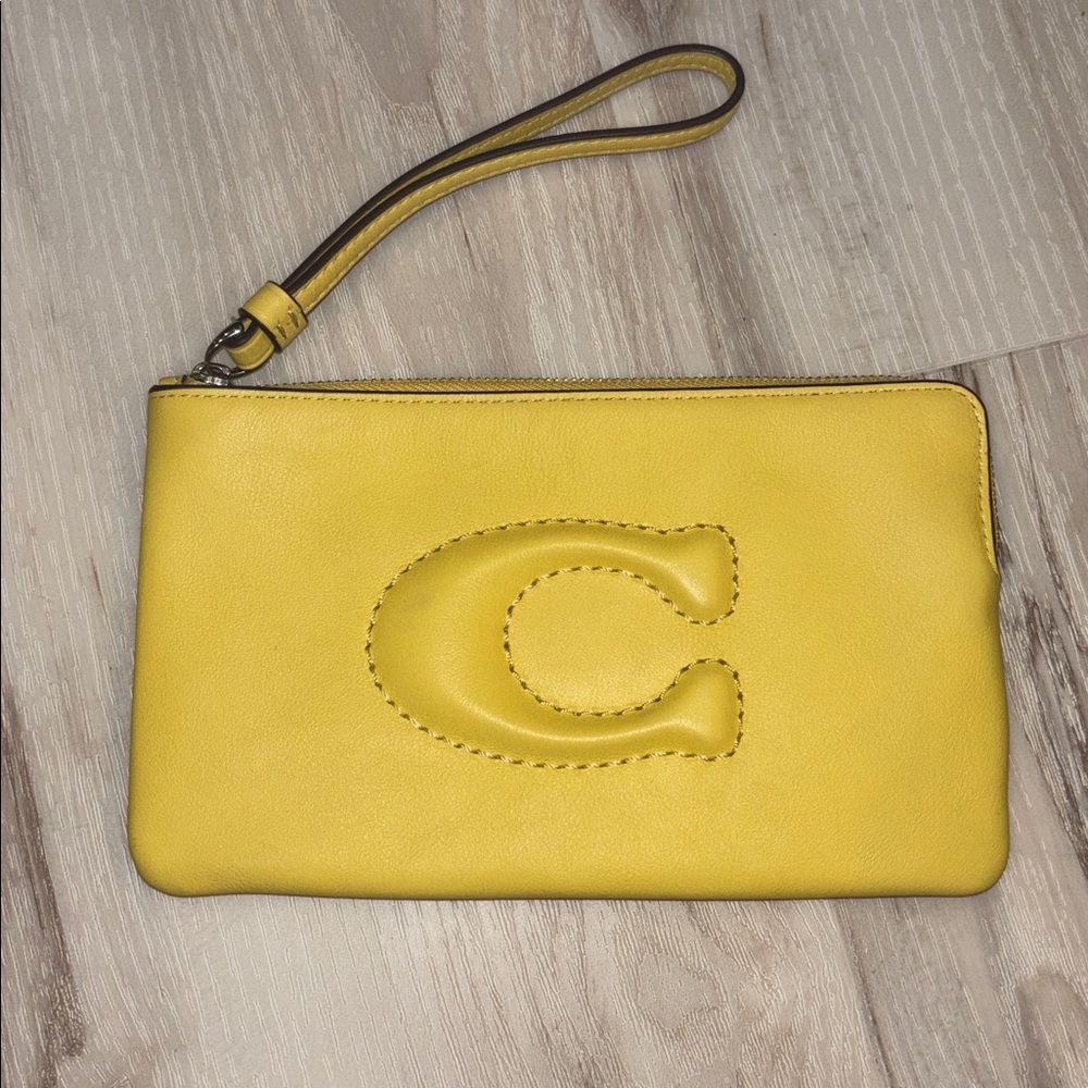 COACH Yellow “Daisy” Leather Wristlet Clutch